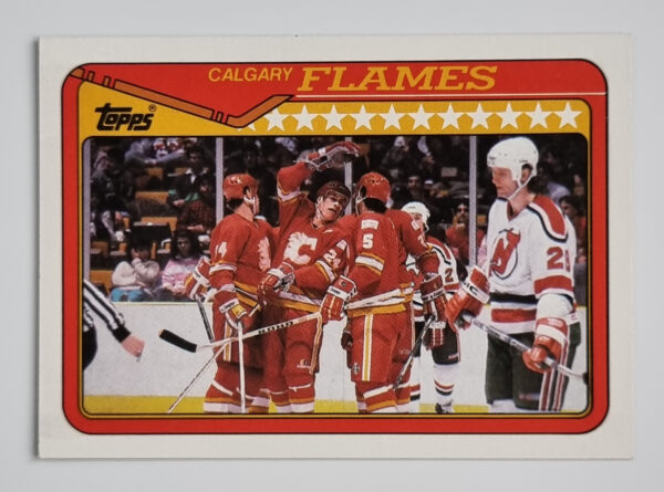1990-91 Topps #38 Flames Team/Brian Bradley/Jim Peplinski/Dana Murzyn