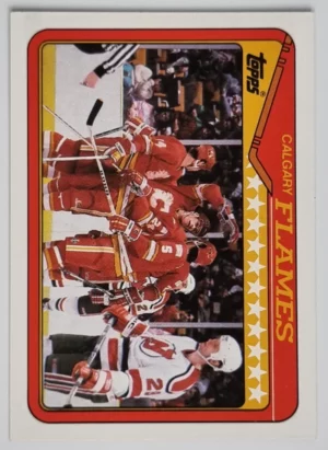 1990-91 Topps #38 Flames Team/Brian Bradley/Jim Peplinski/Dana Murzyn